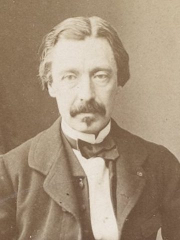 Photograph of L&eacute;on Foucault, a man with a mustache, in a dark coat and a bow tie
